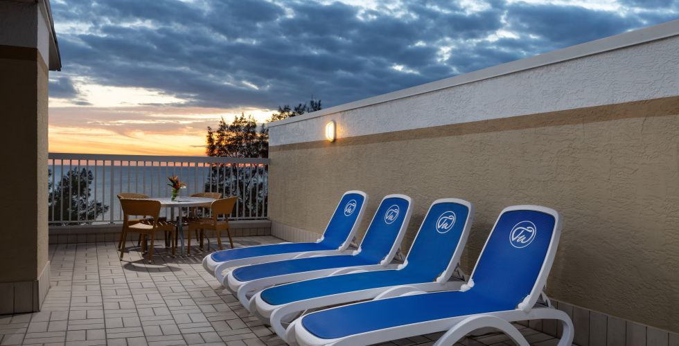 Chairs And Tables On A Deck