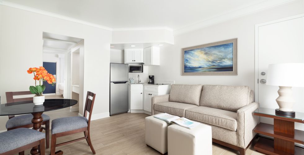 A Living Room With A Couch And A Table