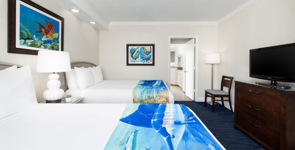 A Hotel Room With A Large Bed