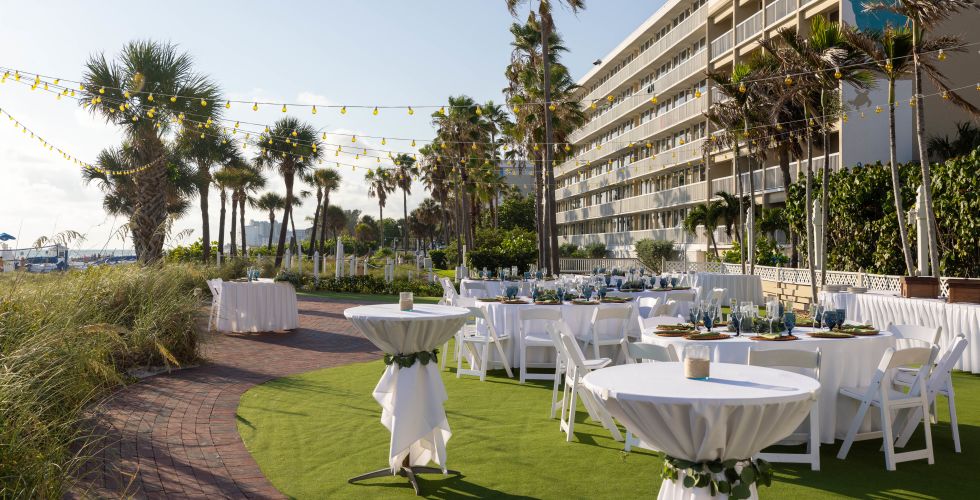 A Set Of Tables And Chairs Outside