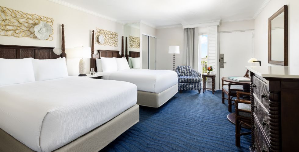 A Bedroom With Two Beds