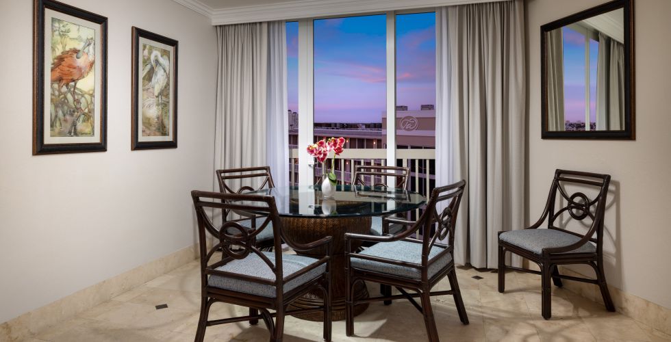 A Dining Room With A Large Window