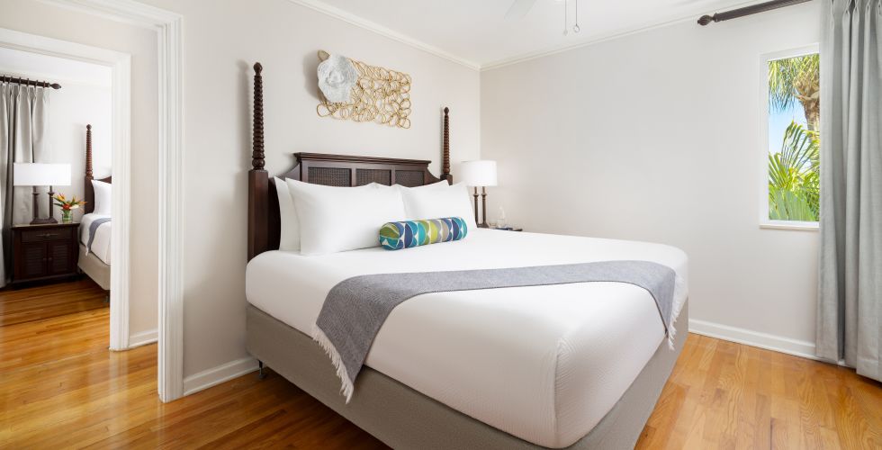 A Bedroom With A Large Bed