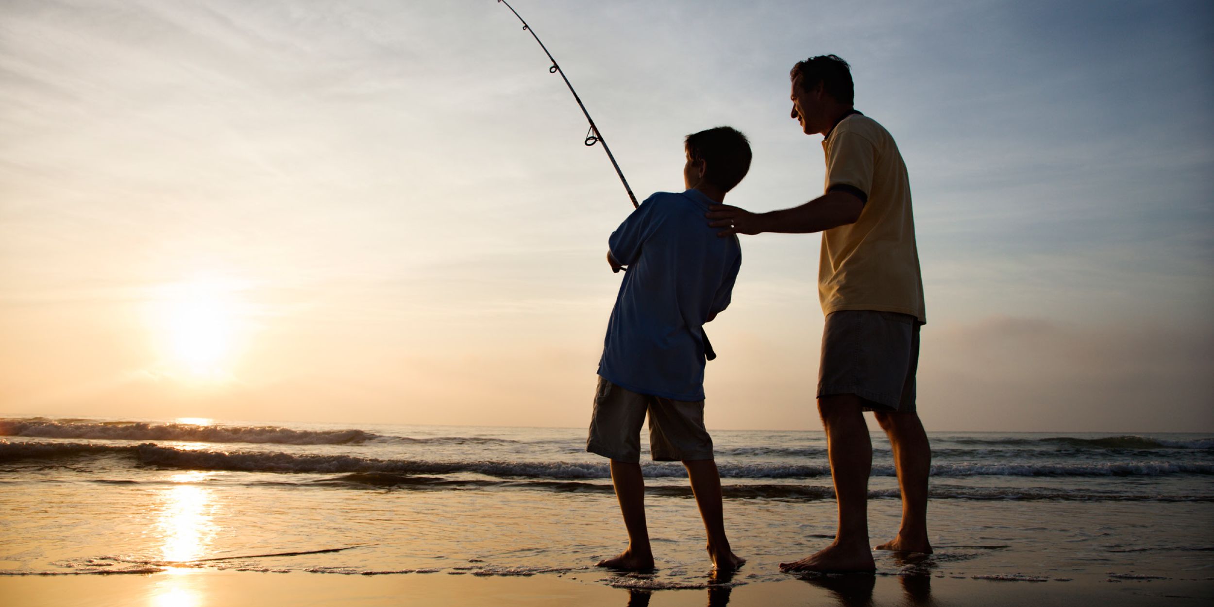 A Man Standing On A Beach