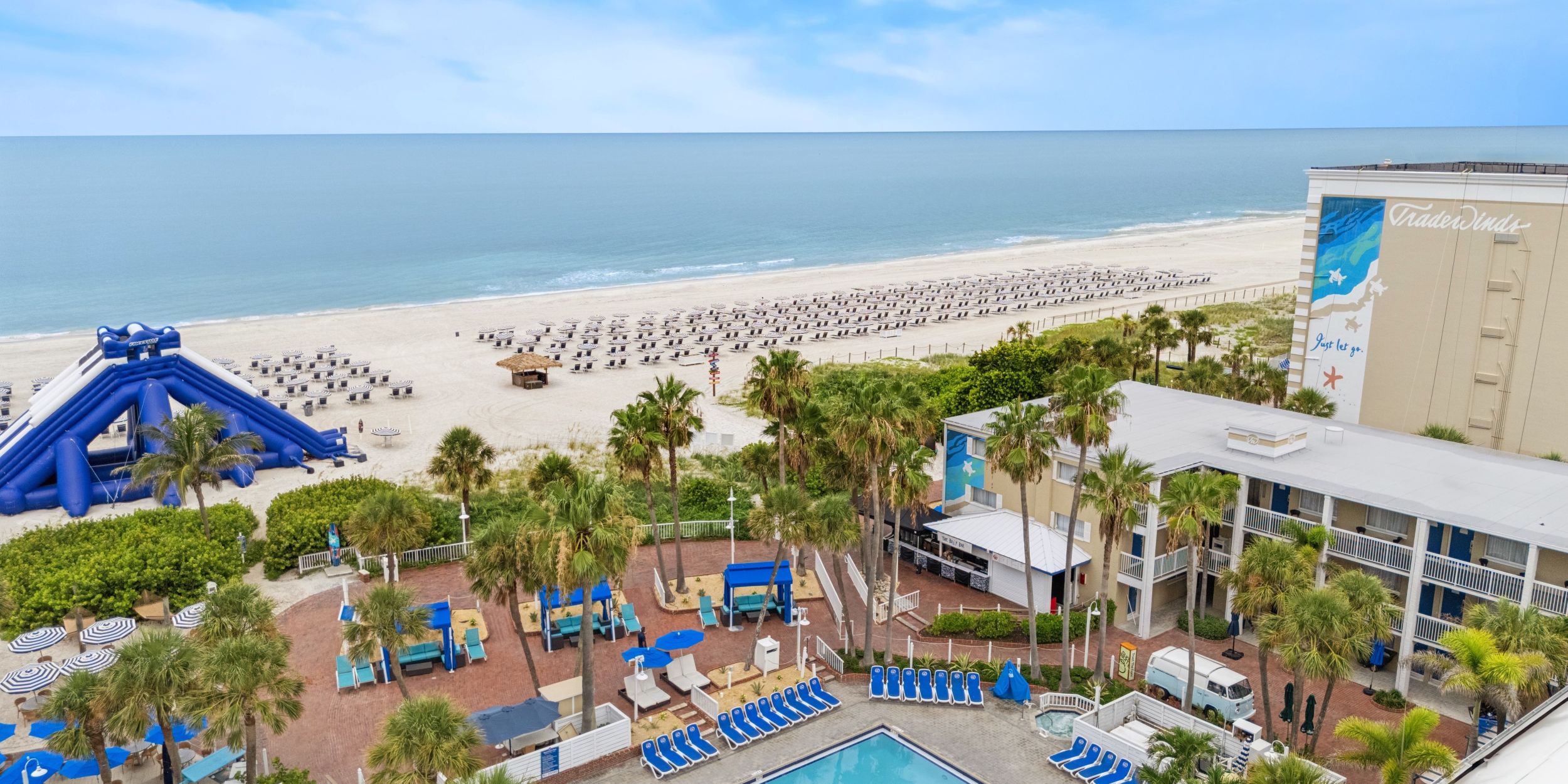 A Resort With A Pool And A Beach