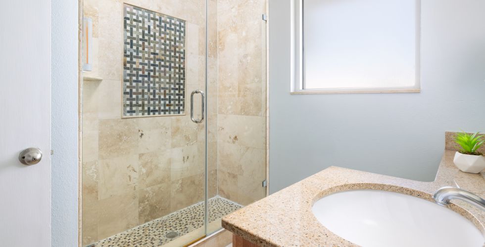 A Bathroom With A Glass Shower