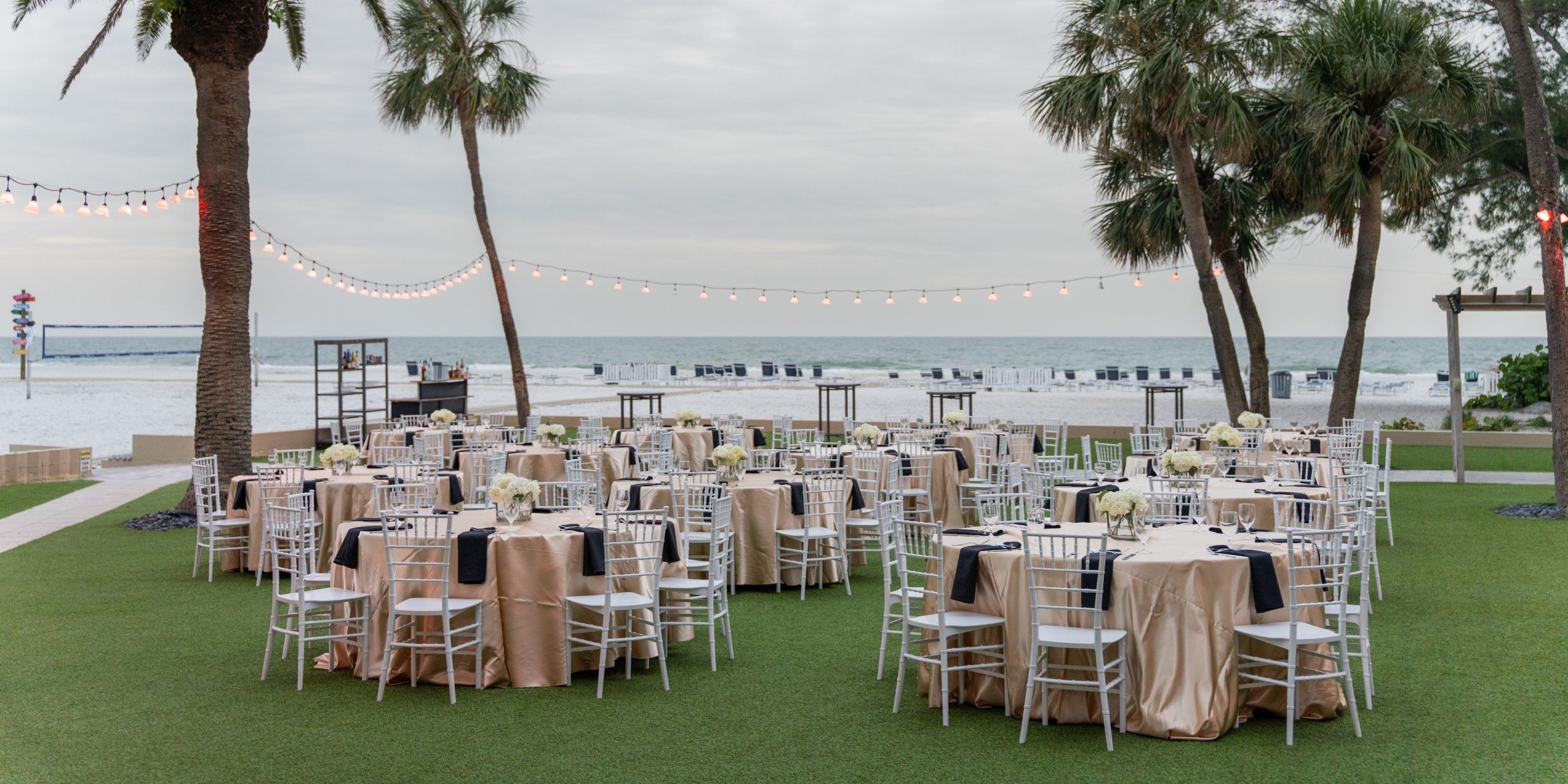 A Group Of Chairs And Tables Outside