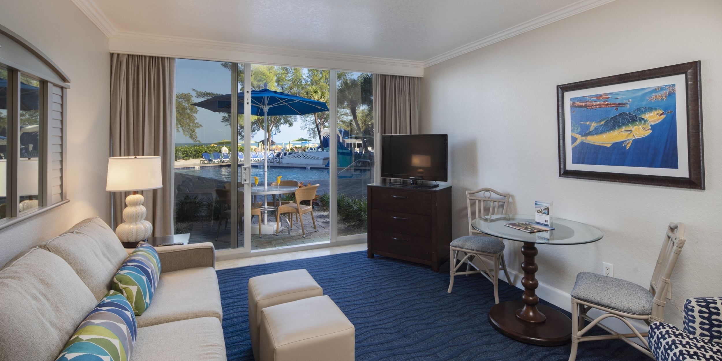 A Living Room Filled With Furniture And A Fireplace