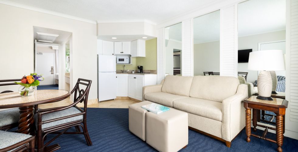 A Living Room With A Couch And A Table