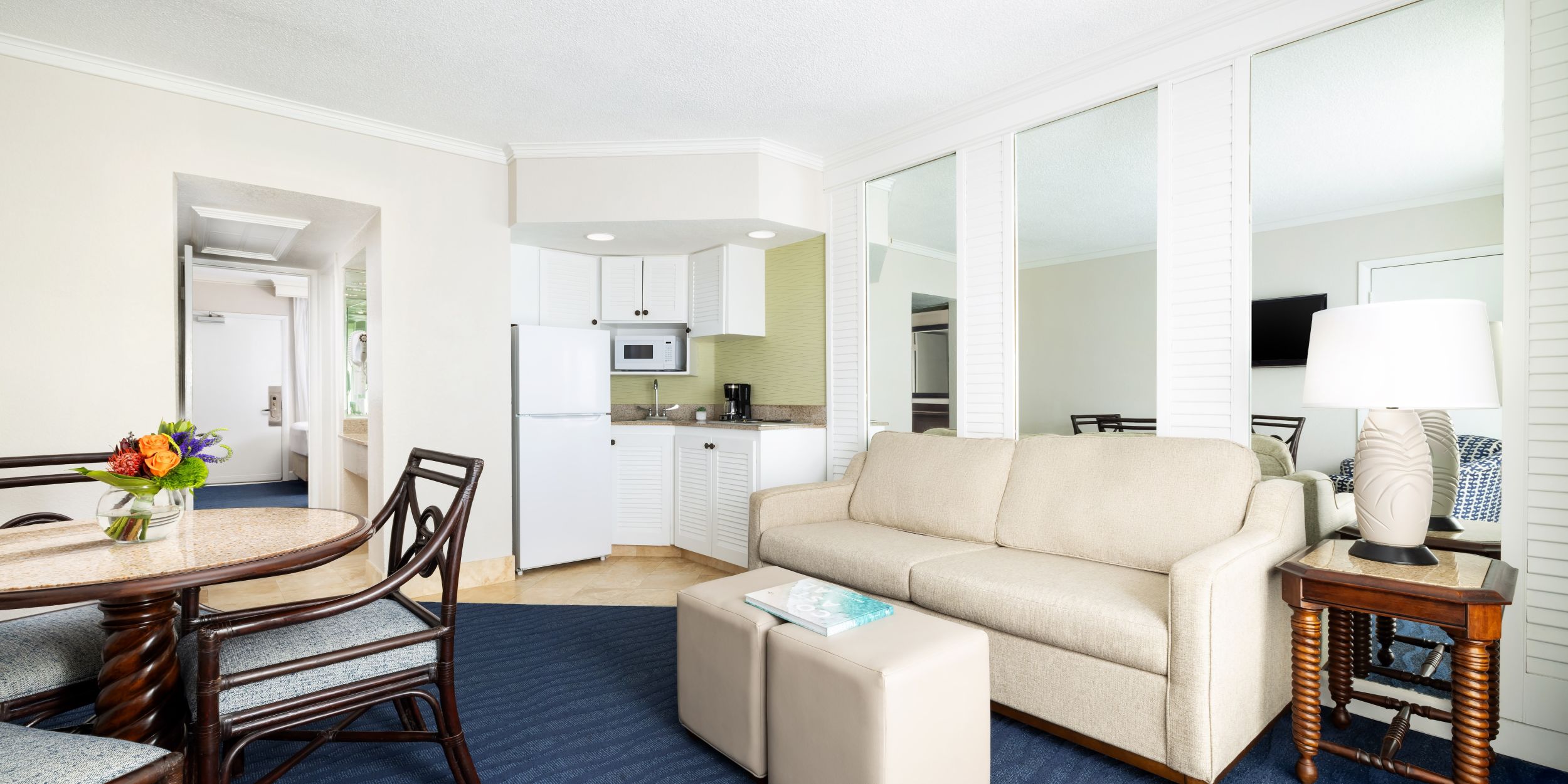 A Living Room With A Couch And A Table