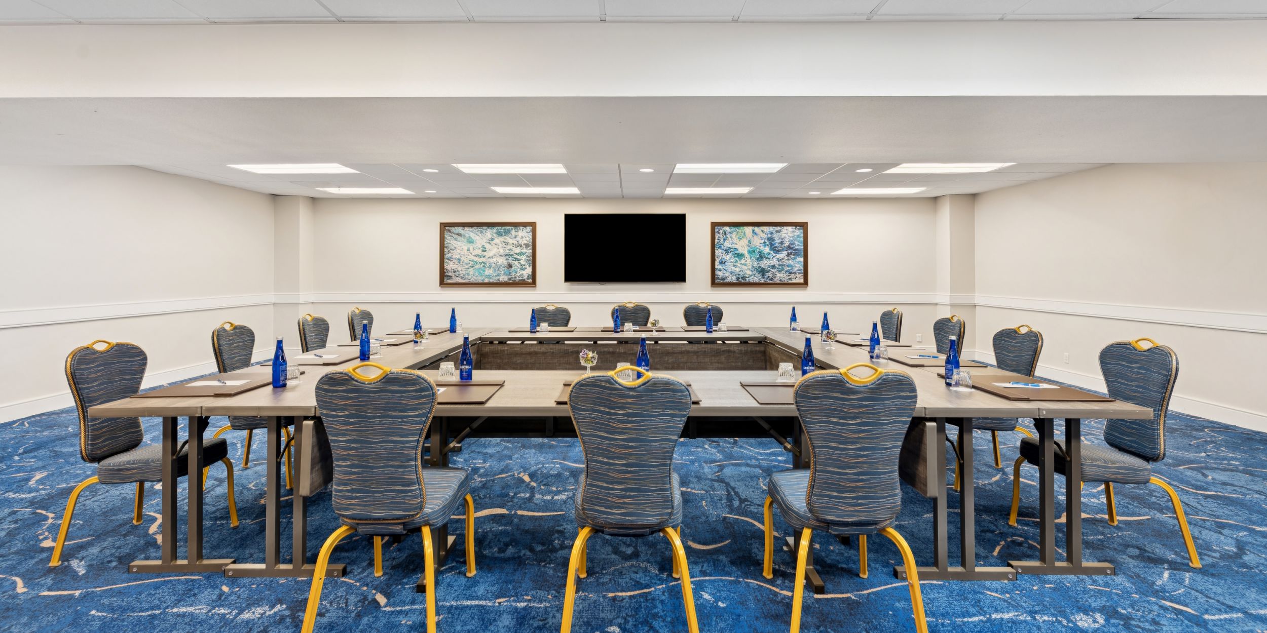 A Room With Tables And Chairs