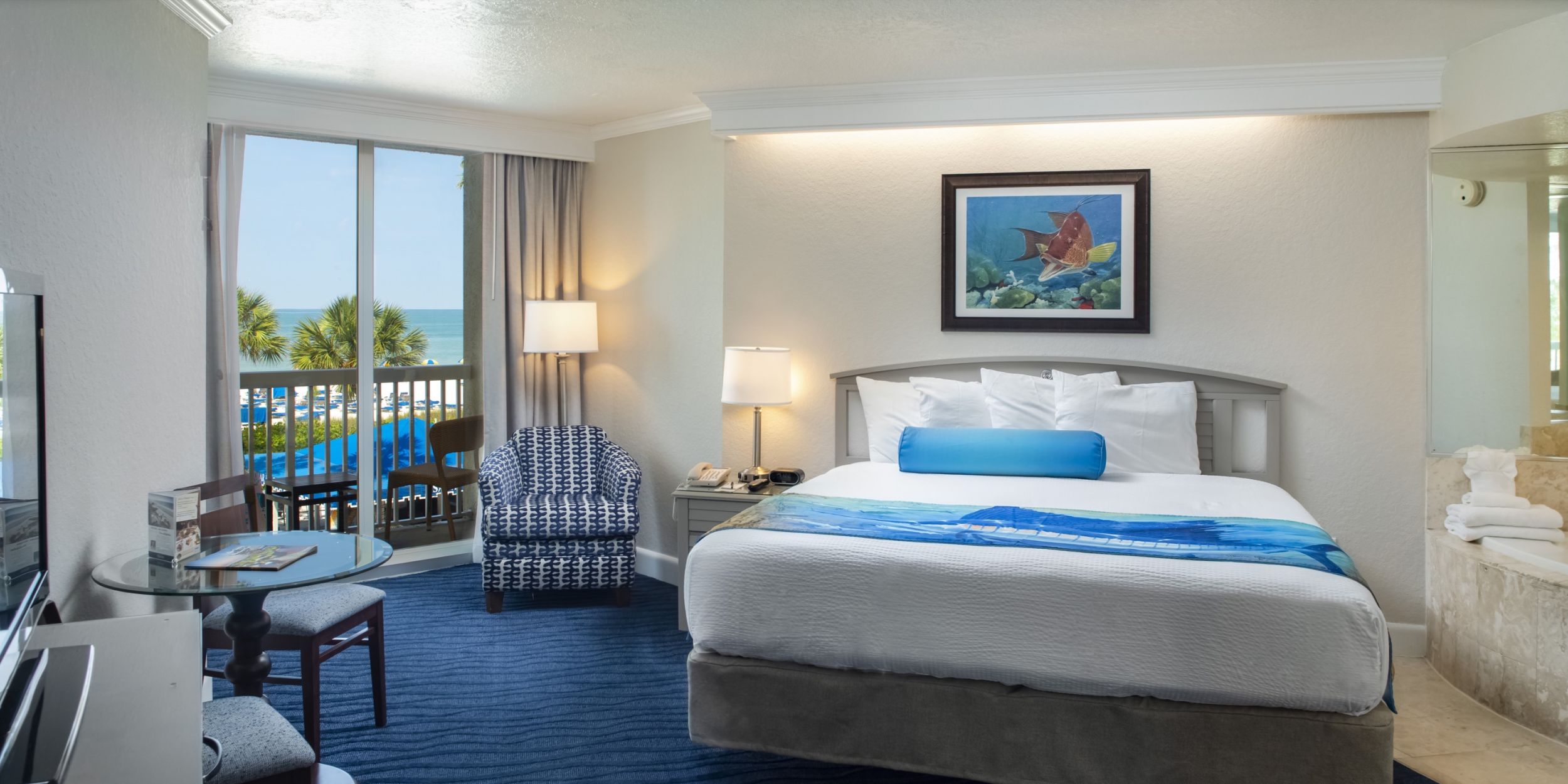 A Hotel Room With A Large Window