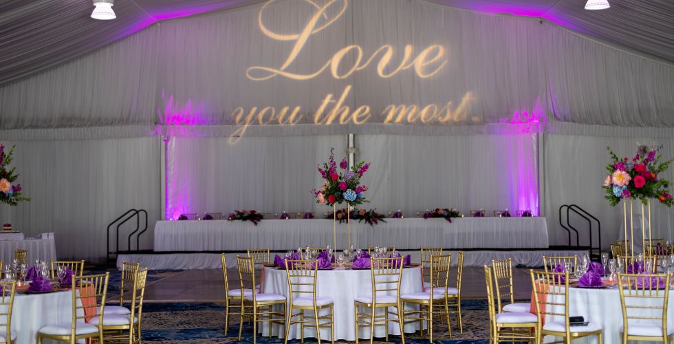 A Large Room With Tables And Chairs