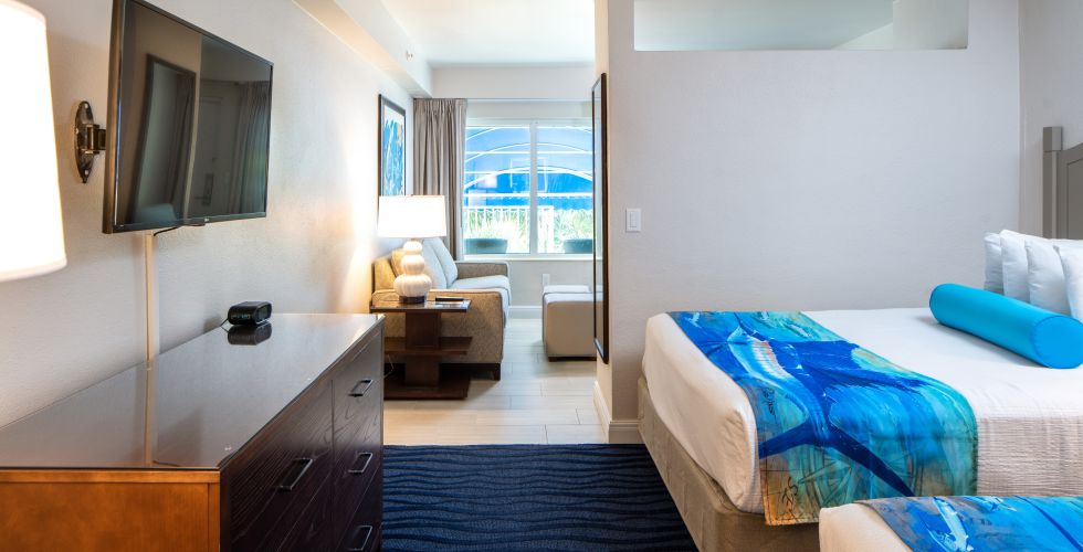 A Room With Beds And A Window