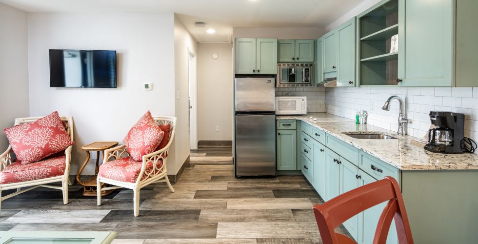 A Kitchen With A Wood Floor