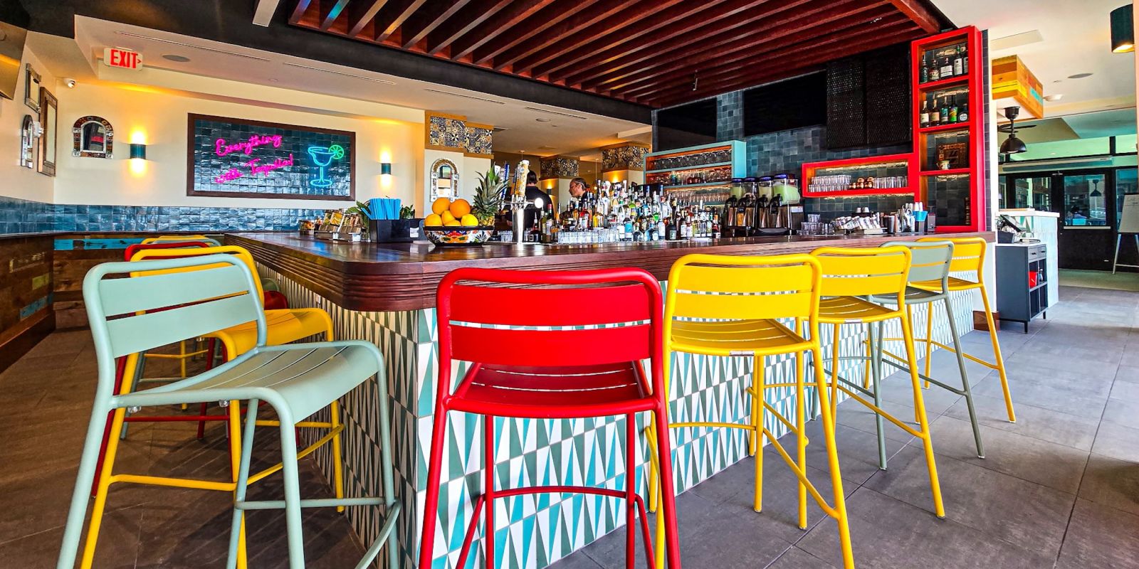 A Restaurant With Yellow Chairs