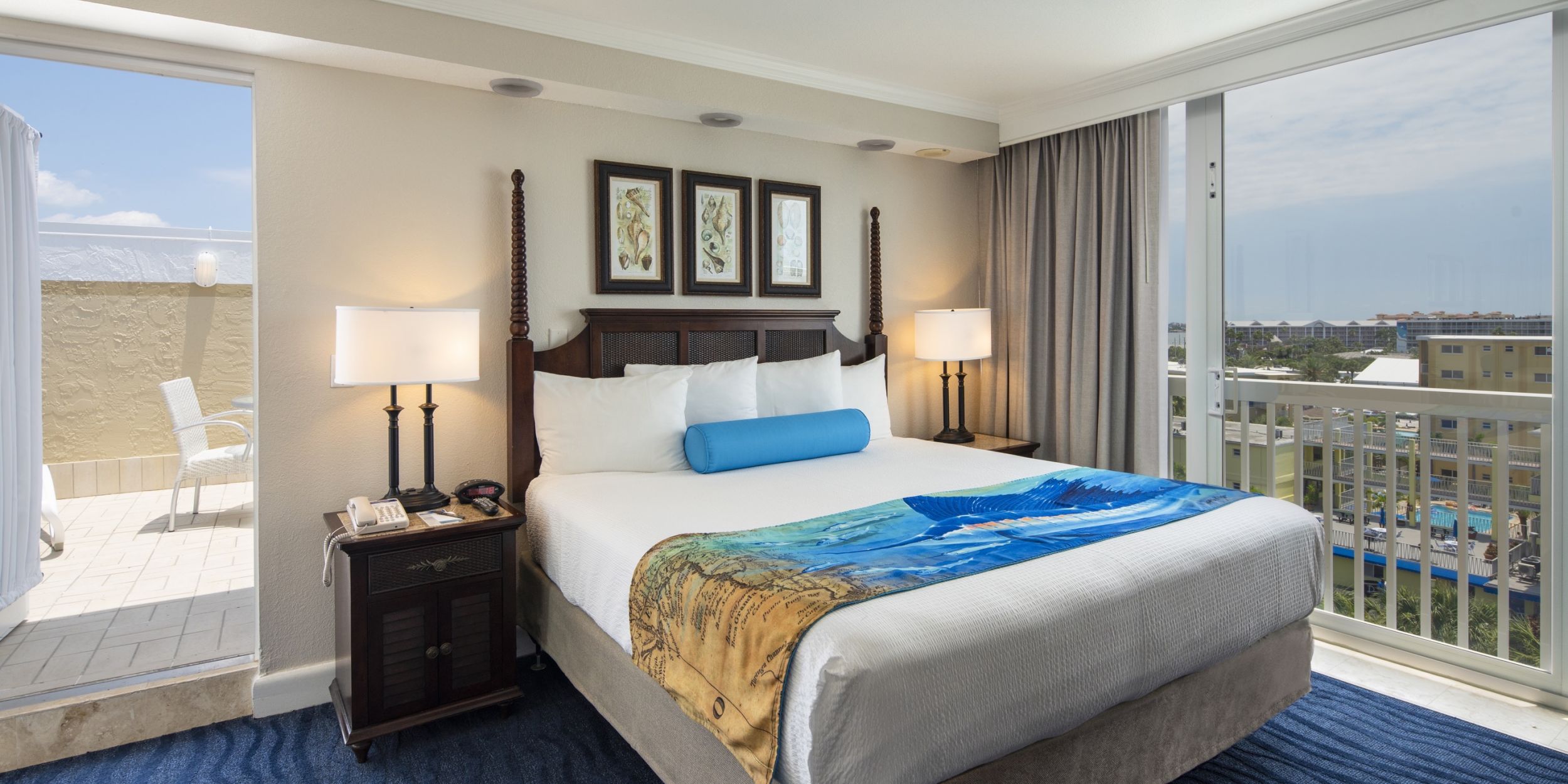 A Bedroom With A Large Bed In A Hotel Room