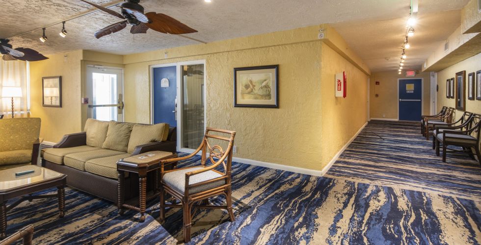 A Living Room With A Couch And A Table