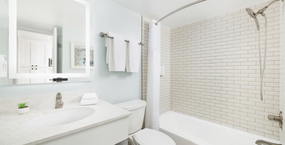 A Bathroom With A Tub Toilet And Sink