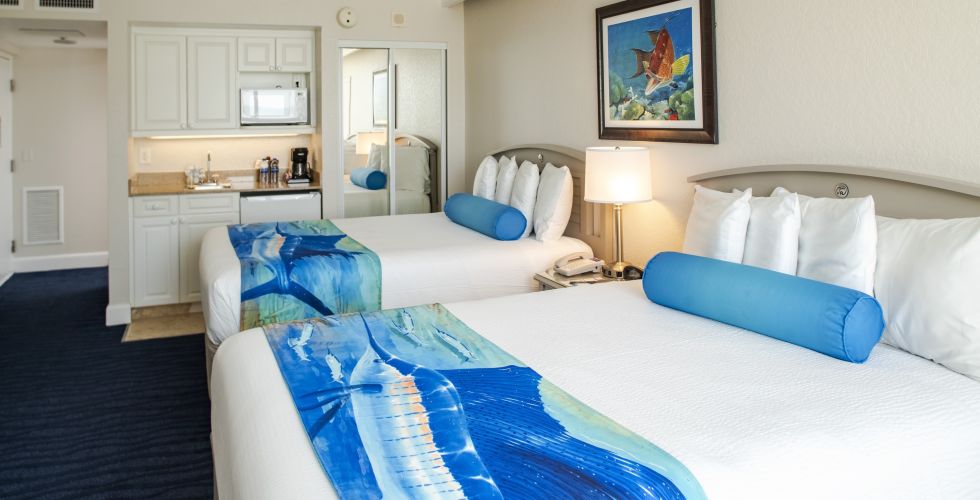 A Bedroom With A Bed In A Room