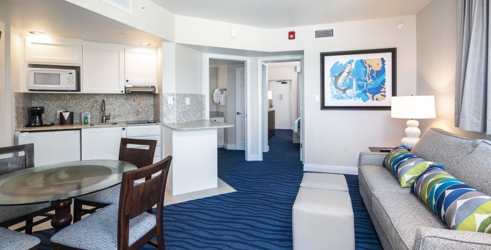 A Living Room With A Blue Carpet