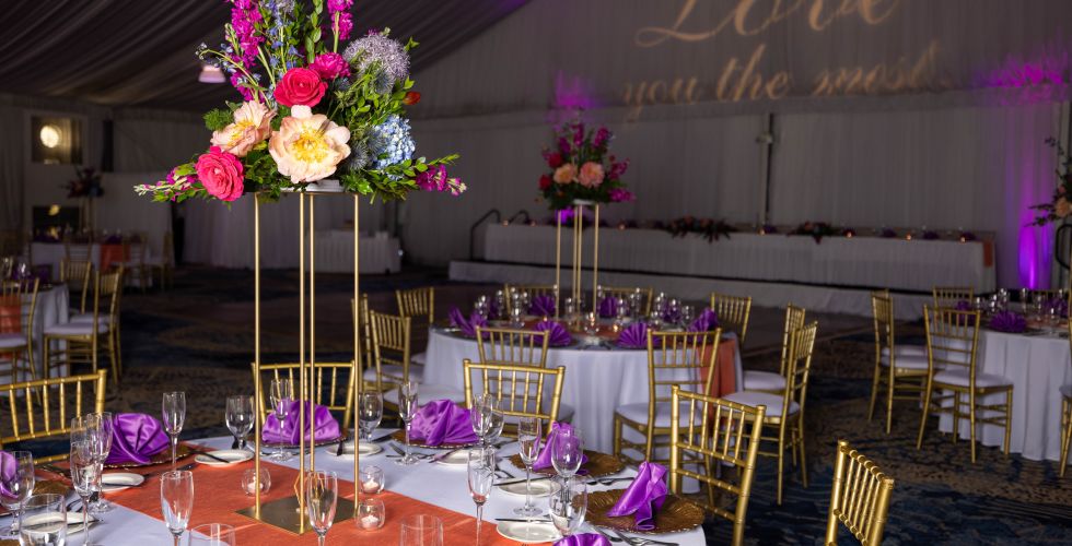 A Large Room With Tables Set For A Wedding