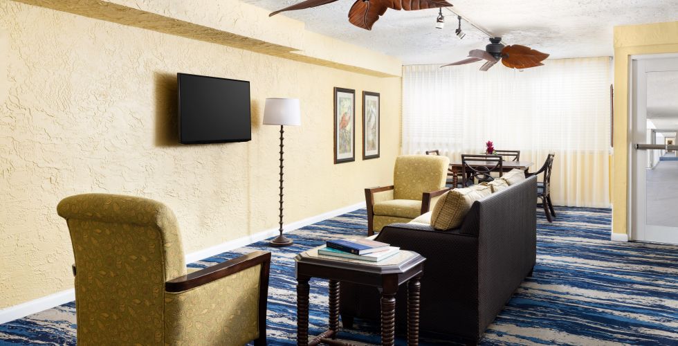 A Living Room With A Couch And A Table