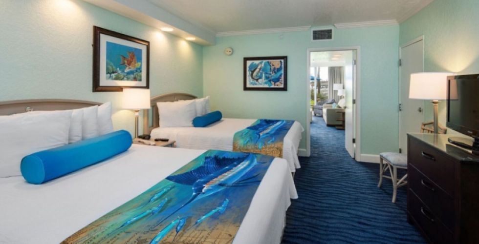 A Bedroom With A Bed In A Room