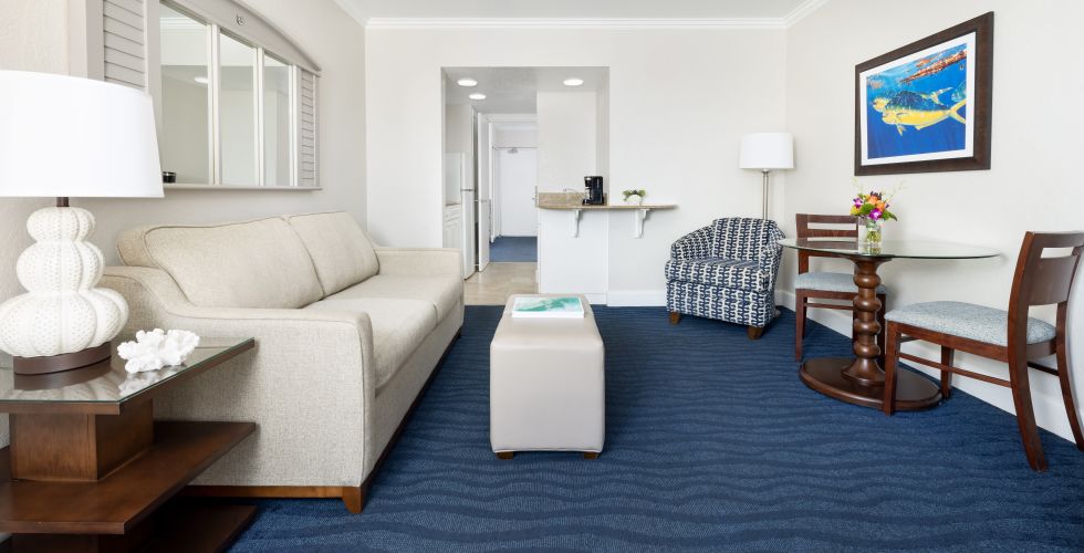A Living Room With A Blue Carpet