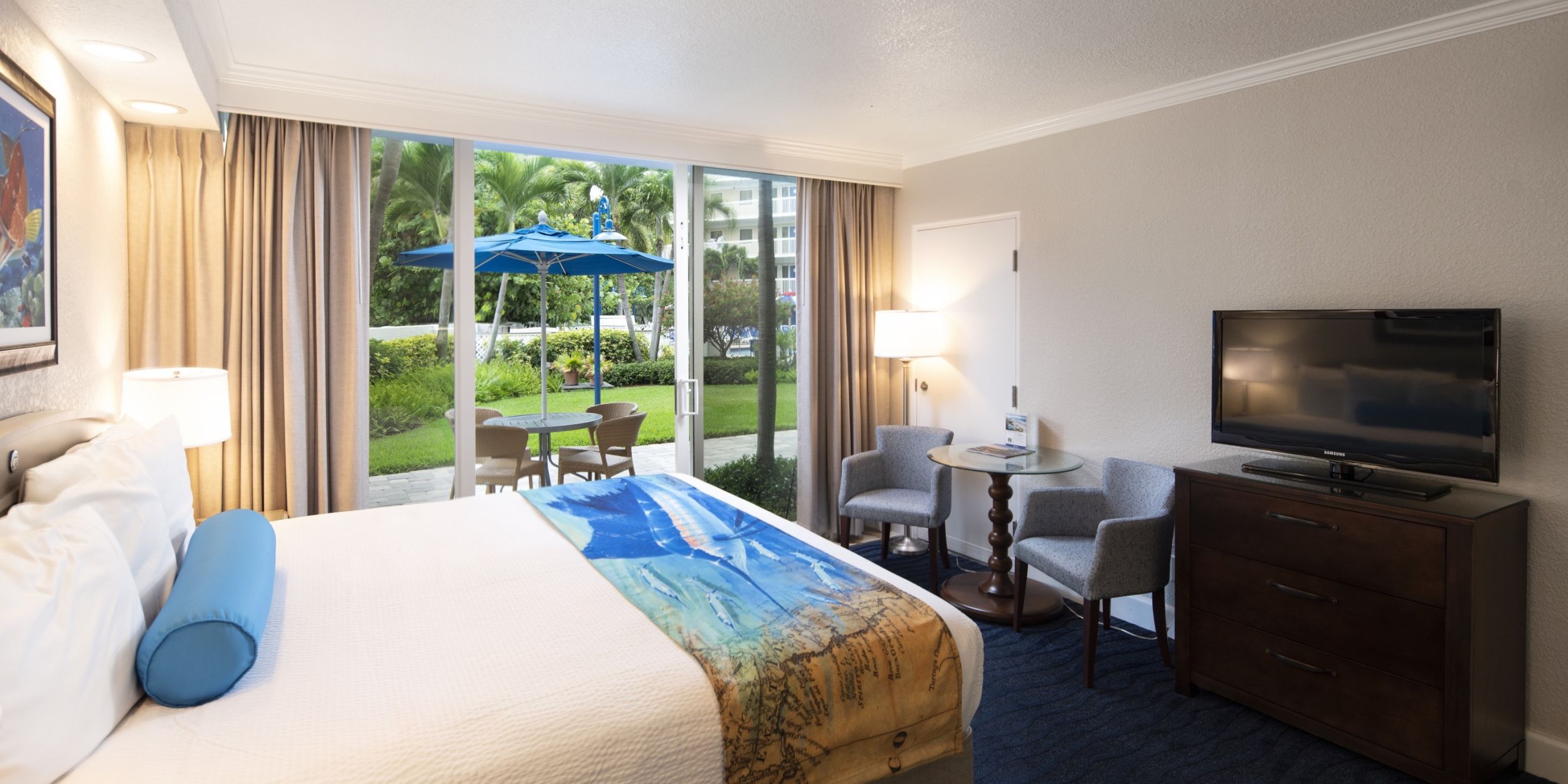 A Bedroom With A Large Bed In A Hotel Room