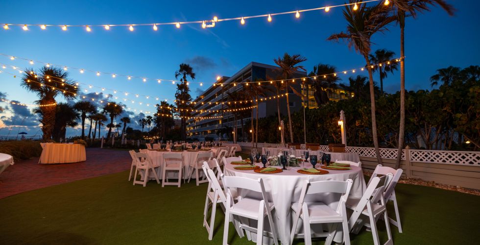A Set Of Tables And Chairs Outside