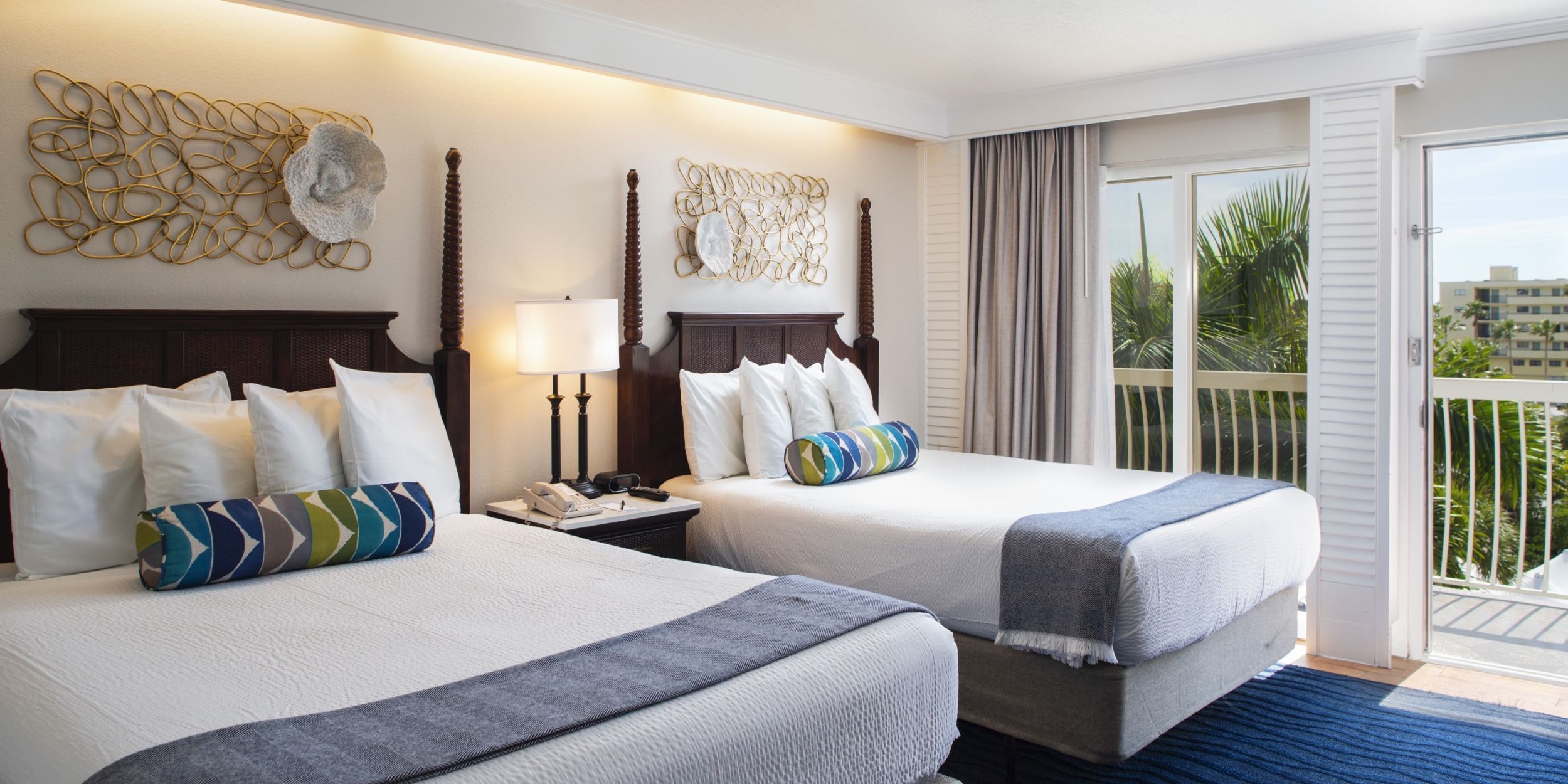 A Bedroom With A Large Bed In A Hotel Room