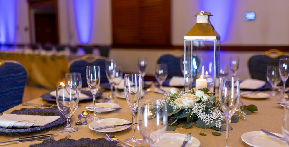 A Table With Plates And Glasses On It