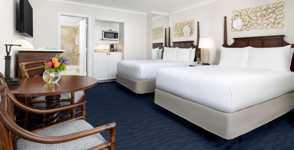 A Bedroom With Two Beds