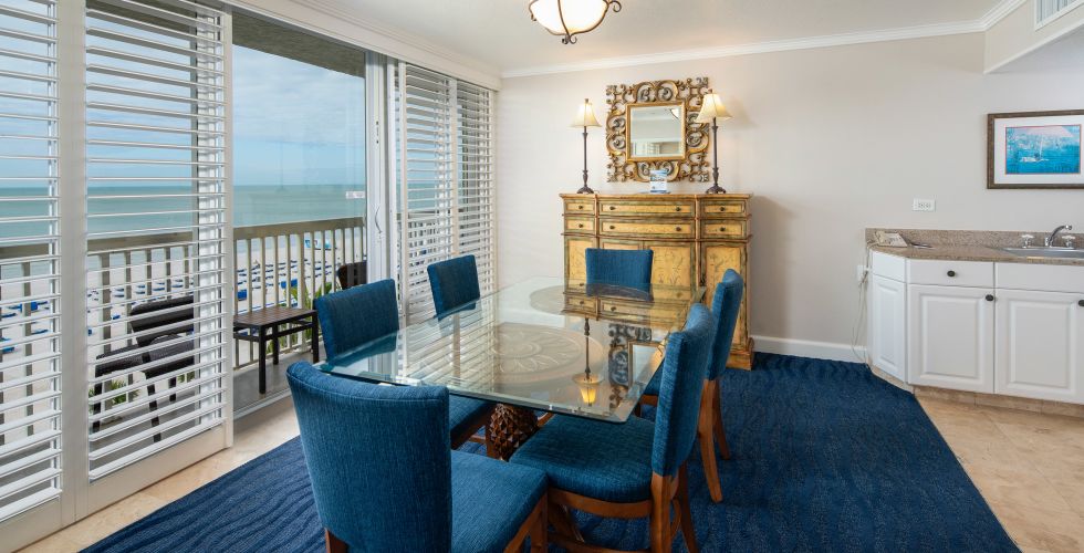 A Room Filled With Furniture And A Large Window