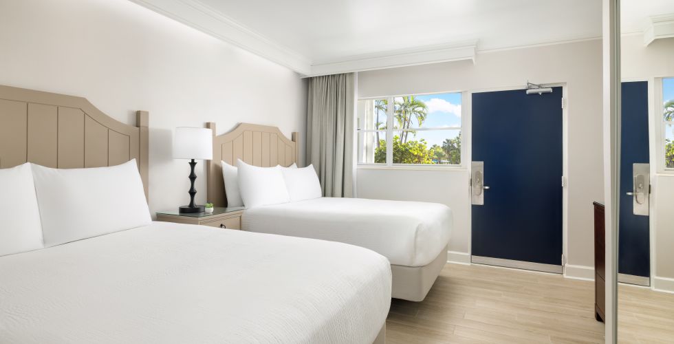 A Bedroom With Two Beds