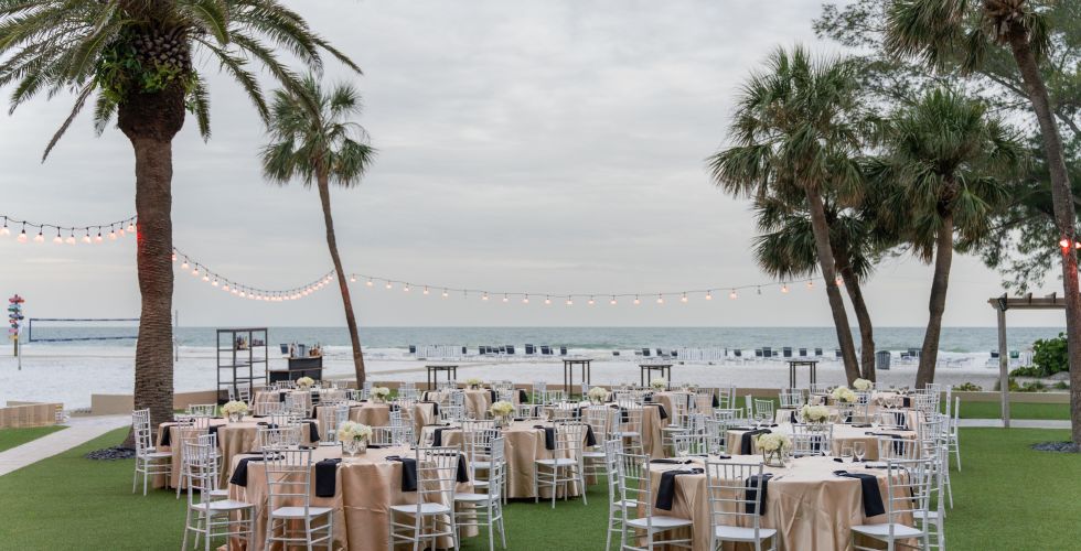 A Group Of Chairs And Tables Outside