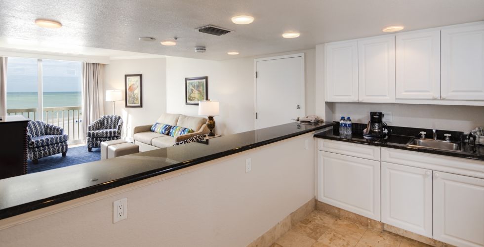 A Kitchen With A Sink And A Window