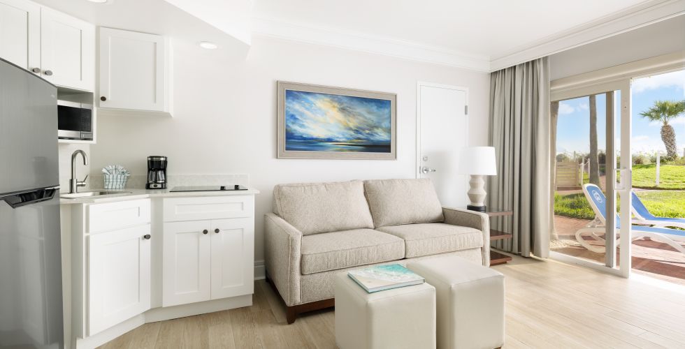 A Living Room With A Couch And A Table