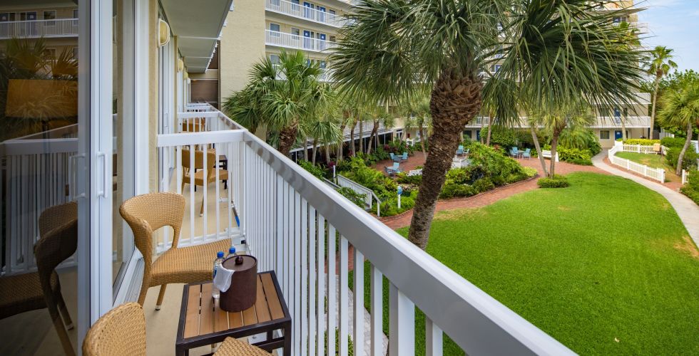 A House With A Fence In A Garden
